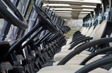 golf-carts-in-a-line golf carts in a line for a tournament