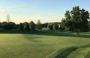 Guelph Lakes Golf Club 18 green during sunrise